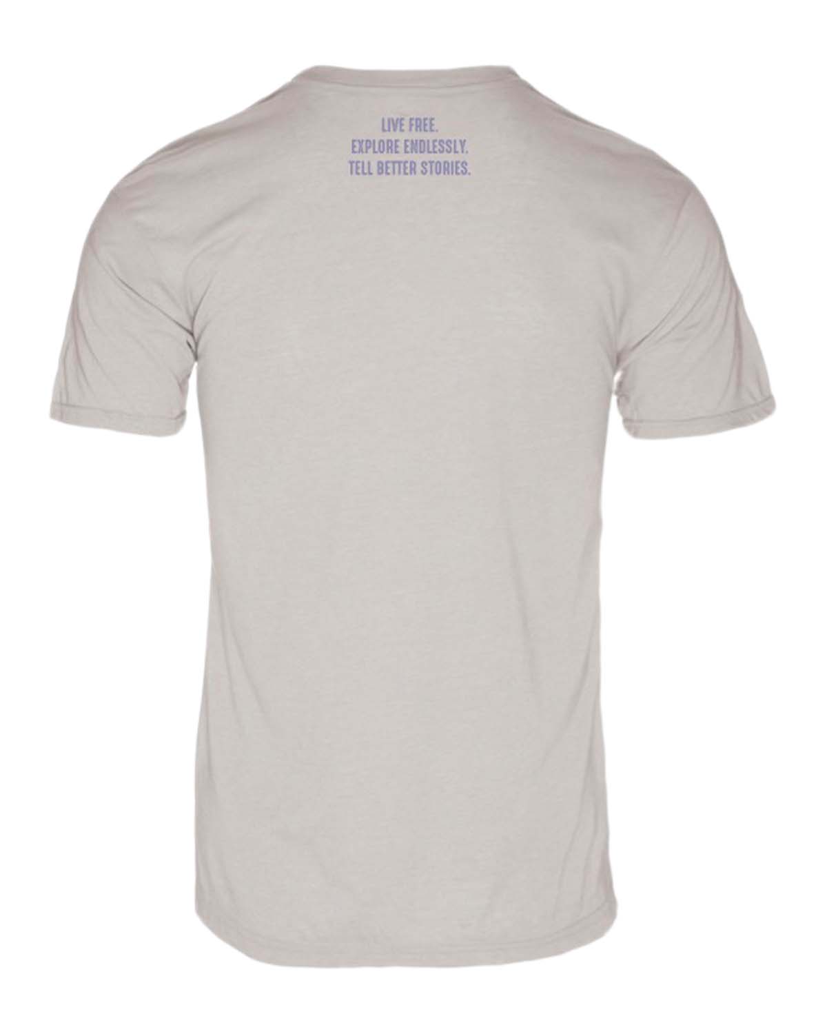 Back of light gray t-shirt with 'Live Free. Explore Endlessly. Tell Better Stories.' text, ideal for camper van, vanlife, overlanding, adventure travel enthusiasts.