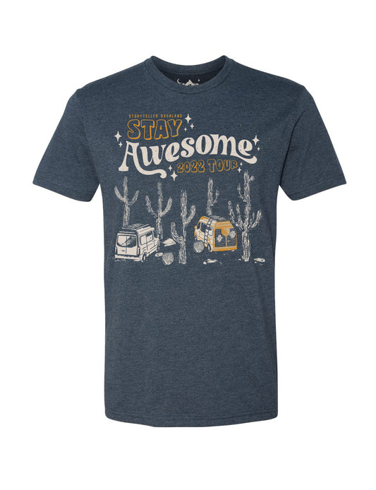Navy t-shirt with Stay Awesome 2022 Tour graphic, cactus, and illustrated camper vans, perfect for vanlife, adventure travel, overlanding, and road trip enthusiasts.