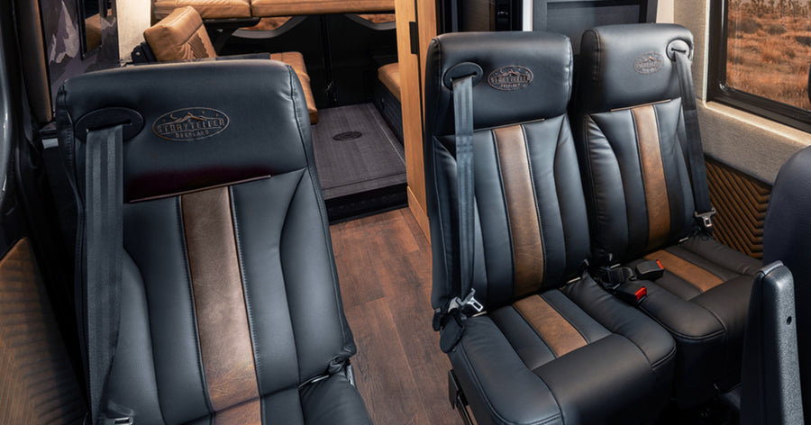 Leather seats inside luxury adventure van, camper van, Class B RV, overland interior