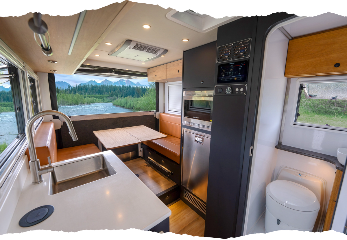 Luxury camper van interior with kitchen, dinette, and river view for adventure travel and vanlife