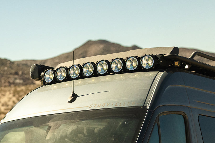 Storyteller MODE 4x4 camper van with roof lights, ready for overlanding and adventure travel in rugged terrain.