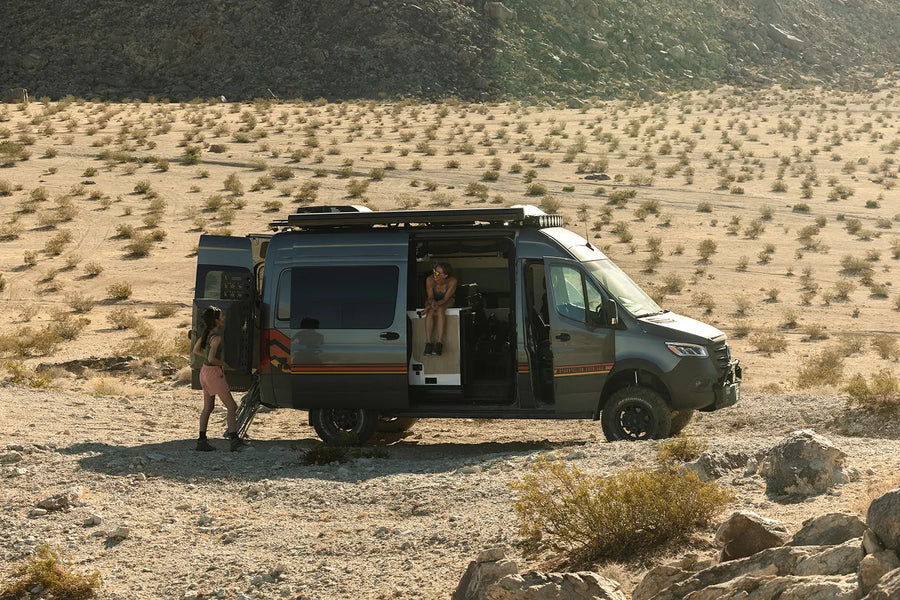Overlanding adventure van in desert, perfect for vanlife and off-road exploration with friends.
