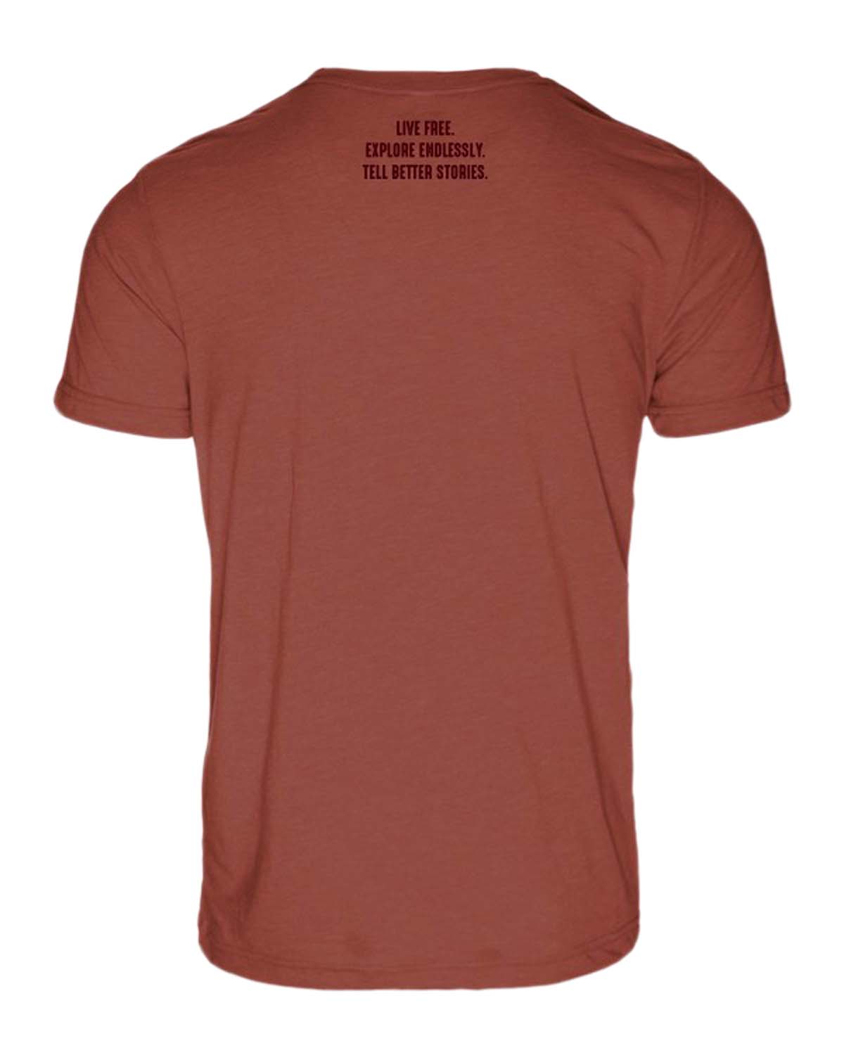 Back of rust-colored t-shirt with 'Live Free. Explore Endlessly. Tell Better Stories.' text, ideal for camper van, vanlife, overlanding, road trip lifestyle.